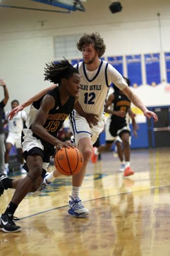 Kayden Dunbar Drives Around the Defender