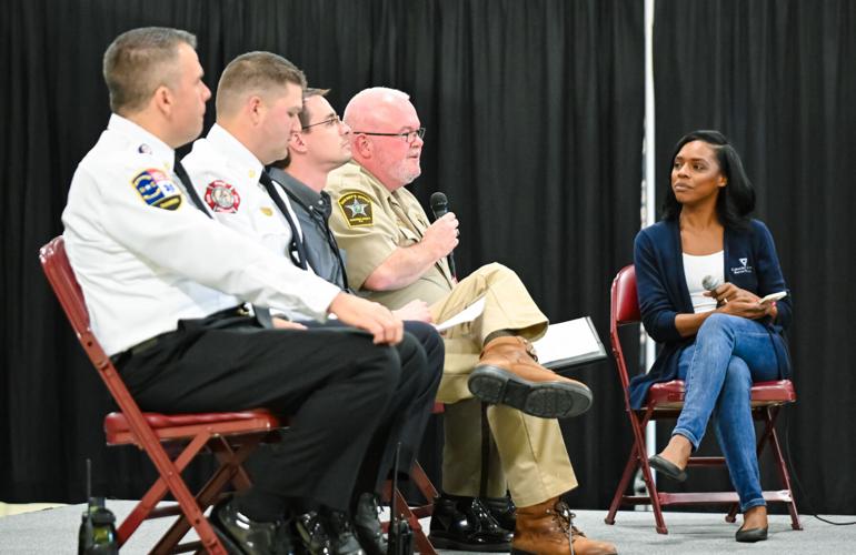 Dominique Clark moderating an event
