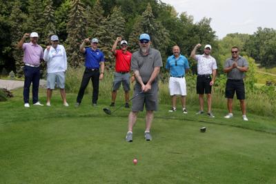 Jamie Heim takes his son Jonah's friends and coaches golfing