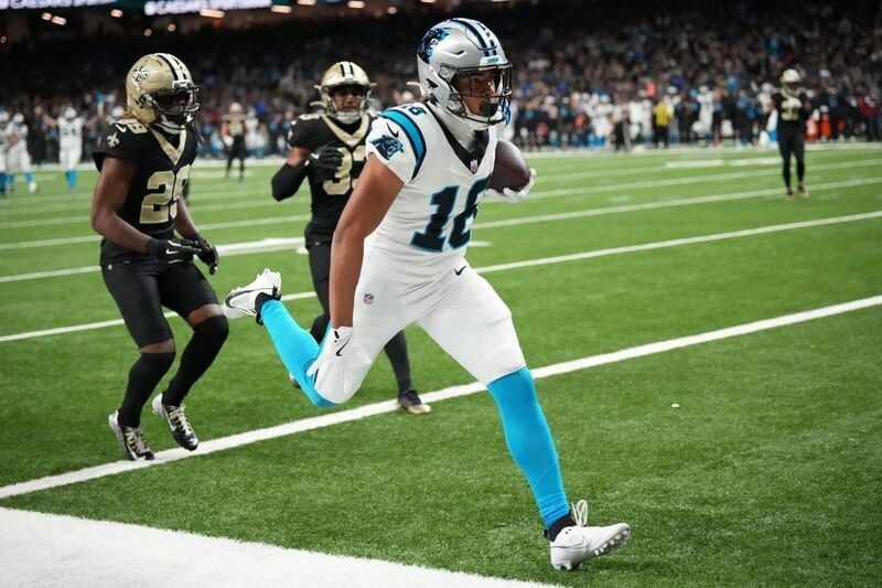 Dec 14, 2025; New Orleans, Louisiana, USA; Carolina Panthers wide receiver Jalen Coker (18) scores a touchdown in the third quarter against the New Orleans Saints at Caesars Superdome. Mandatory Credit: Matthew Hinton-Imagn Images