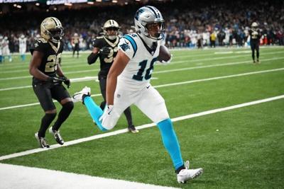 Dec 14, 2025; New Orleans, Louisiana, USA; Carolina Panthers wide receiver Jalen Coker (18) scores a touchdown in the third quarter against the New Orleans Saints at Caesars Superdome. Mandatory Credit: Matthew Hinton-Imagn Images