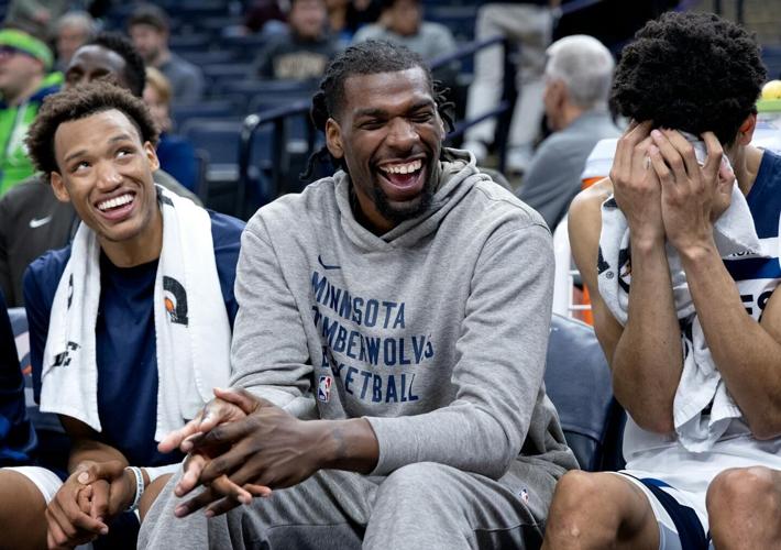 Wendell Moore Jr., Naz Reid and Josh Minott (8) of the Minnesota Timberwolves enjoy a lighthearted moment in the fourth quarter Tuesday, October 17, 2023, at Target Center in Minneapolis, Minn.  ] CARLOS GONZALEZ  carlos.gonzalez@startribune.com ORG XM...