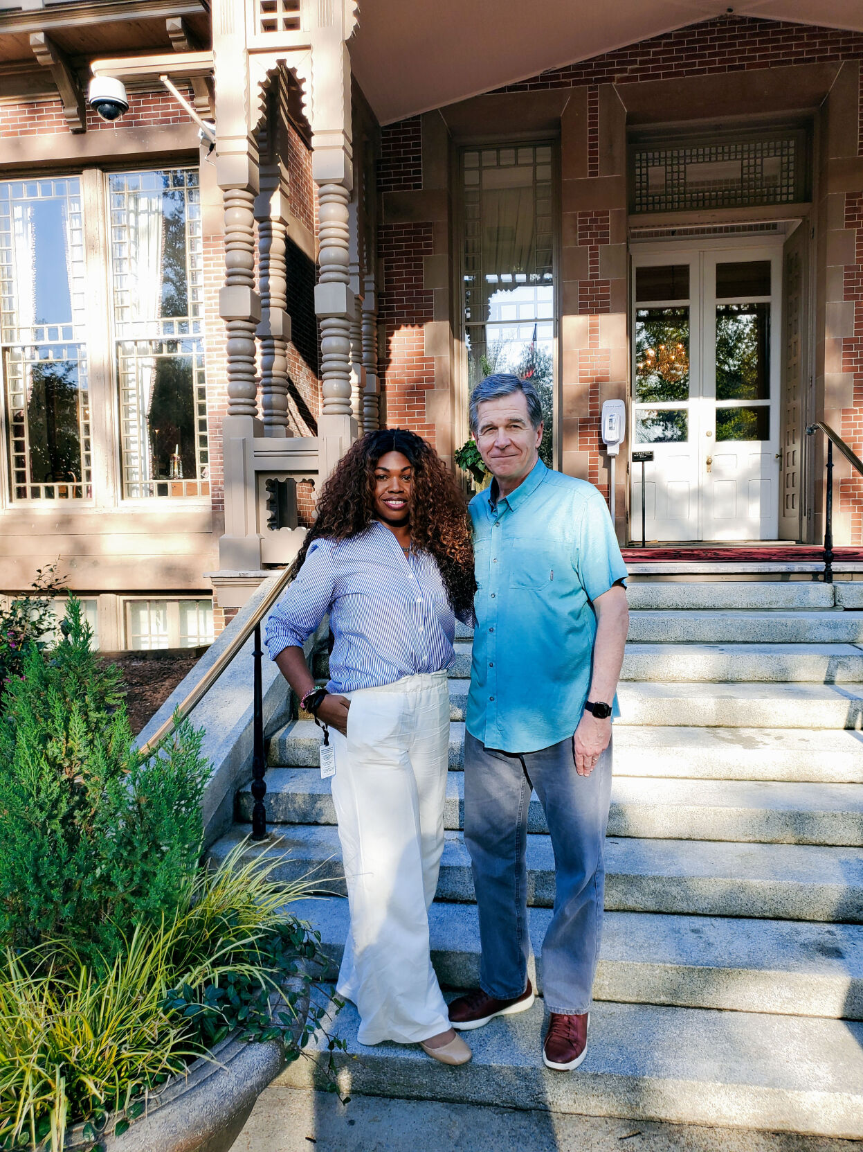 Daphne Moore and Governor Roy Cooper