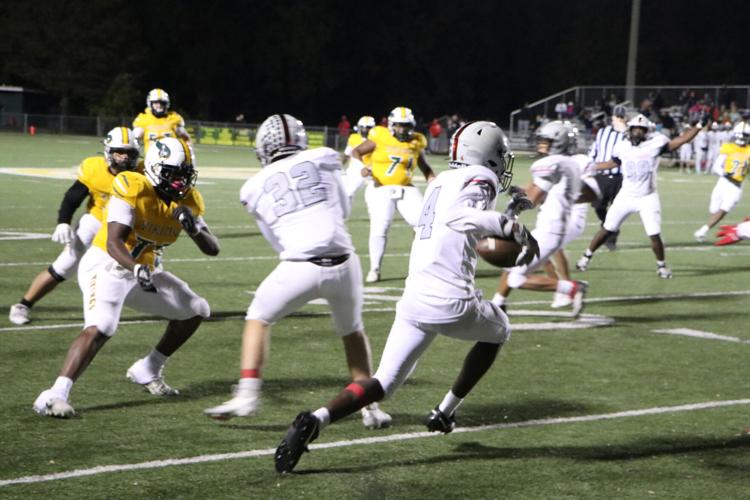Camari McCrae Returns an Interception for the Wolverines.jpg