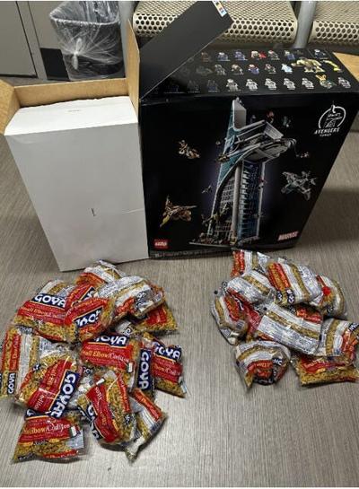 Police say Jarell Augustine of California allegedly purchased Lego sets from Target and then returned them with pasta inside.
