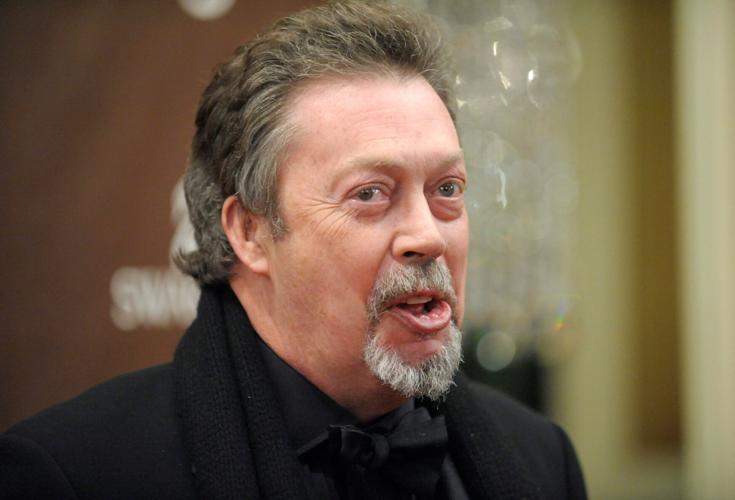 PEOPLE-TIM CURRY/