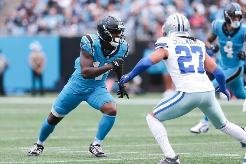 Oct 12, 2025; Charlotte, North Carolina, USA; Carolina Panthers wide receiver Xavier Legette (17) runs a play during the second half against the Dallas Cowboys at Bank of America Stadium. Mandatory Credit: Scott Kinser-Imagn Images