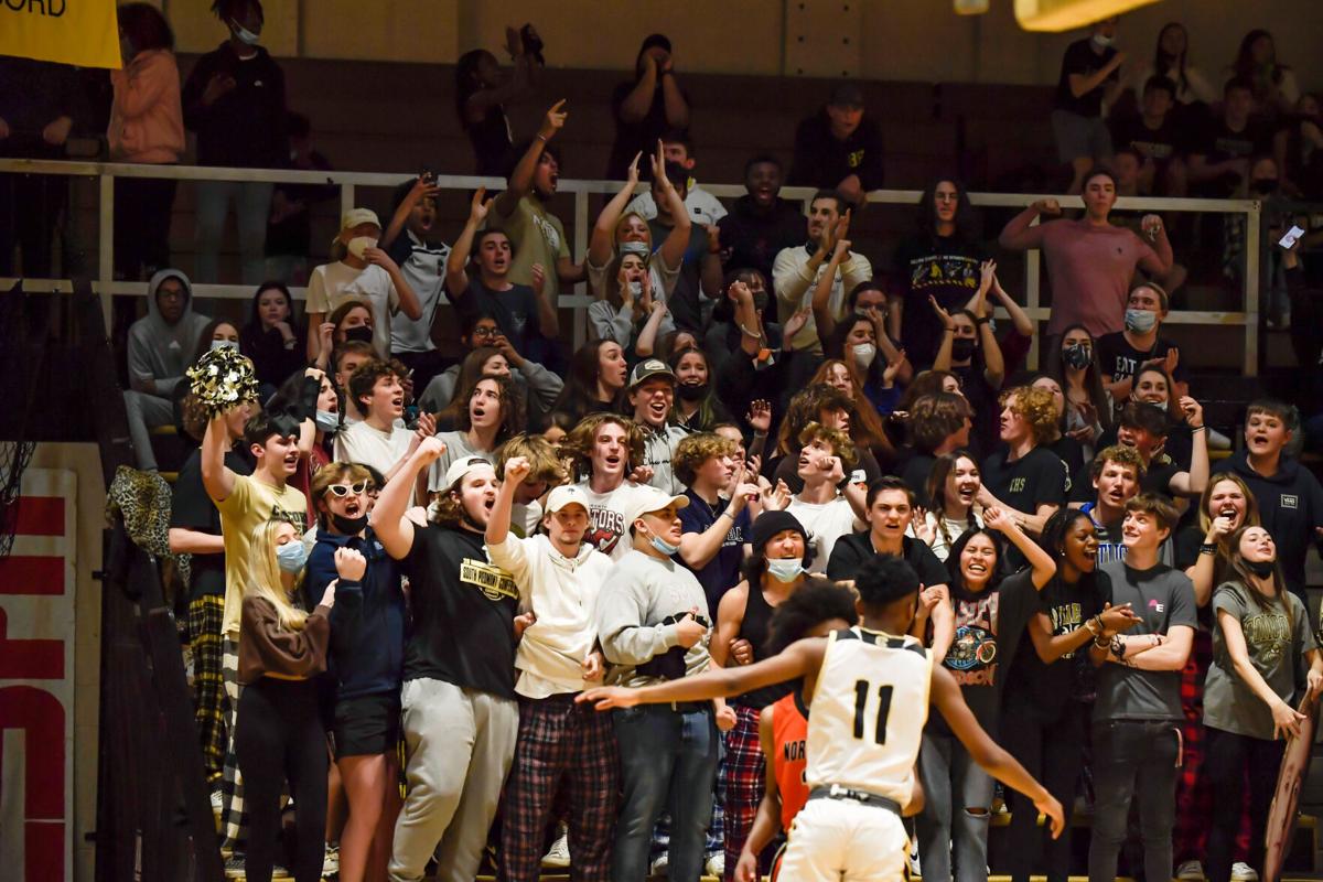 The Trojans defeated the Spiders 51-50 in overtime .