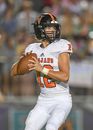 The Chargers defeated the Trojans 35-9.