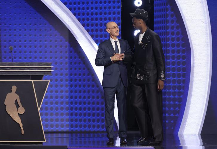 NBA Commissioner Adam Silver poses with AJ Dybantsa, the first pick in the 2026 NBA Draft selected by the Washington Wizards, at Barclays Center in New York on June 23, 2026.
