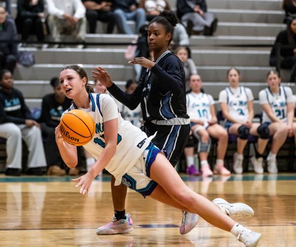 Hickory Ridge beat Cox Mill, 58 - 36