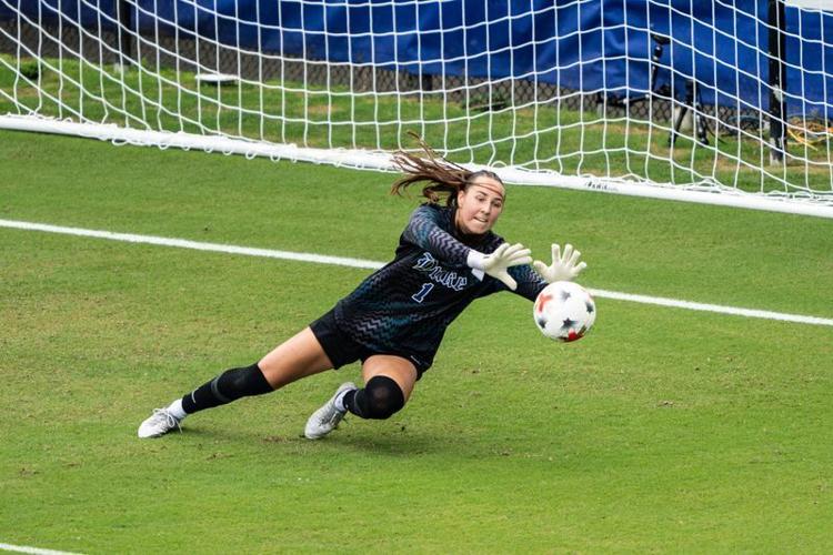 Duke women's soccer Molly Vapensky makes a diving save against No. 1 Stanford on Sept. 13.