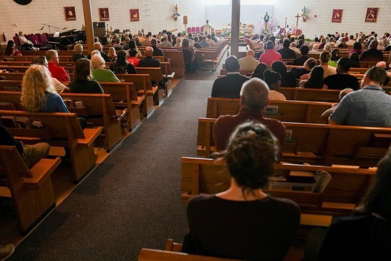 People gather during mass Sunday, April 26, 2026, at St. Susanna Catholic Church in Plainfield, Ind.