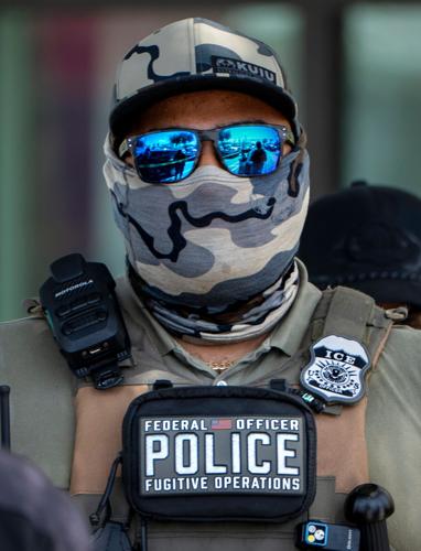 ICE agents and FHP troopers at the El Quetzal Panaderia Y Cafeteria on July 9, 2026 in Lake Worth Beach, Florida.