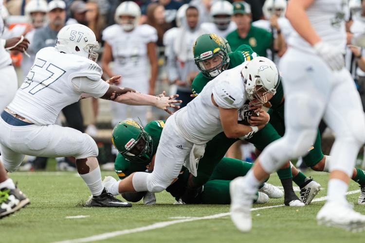 The Ragin' Bulls come from behind in the Battle of the Horns to defeat the Vikings 27-20.