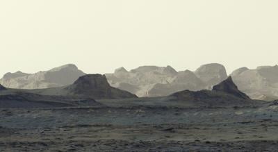 A view of the Martian surface taken by NASA’s Curiosity showing wind-carved crags called yardangs on Mount Sharp