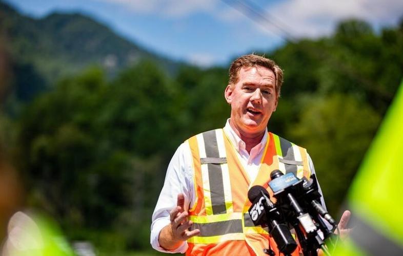 North Carolina Department of Transportation Secretary Daniel Johnson speaks with reporters about ongoing recovery work in Chimney Rock on July 30, 2026.