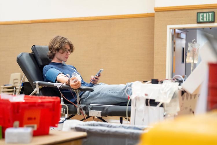 Anton Schehen donates Power Red, a blood donation process by which one can donate two units of red blood cells and plasma and platelets are returned, during an American Red Cross blood drive in Eugene, Oregon on Sept. 2, 2025.
