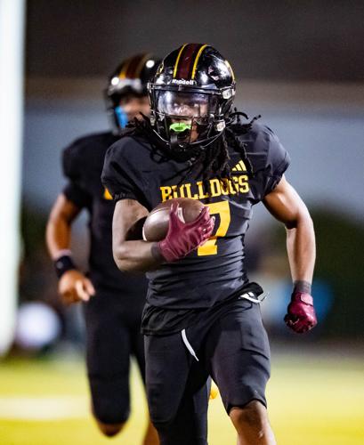 Bulldogs beat the Grizzlies in the third round of the 2025 NCHSAA Football Championship playoff game 41 - 33.