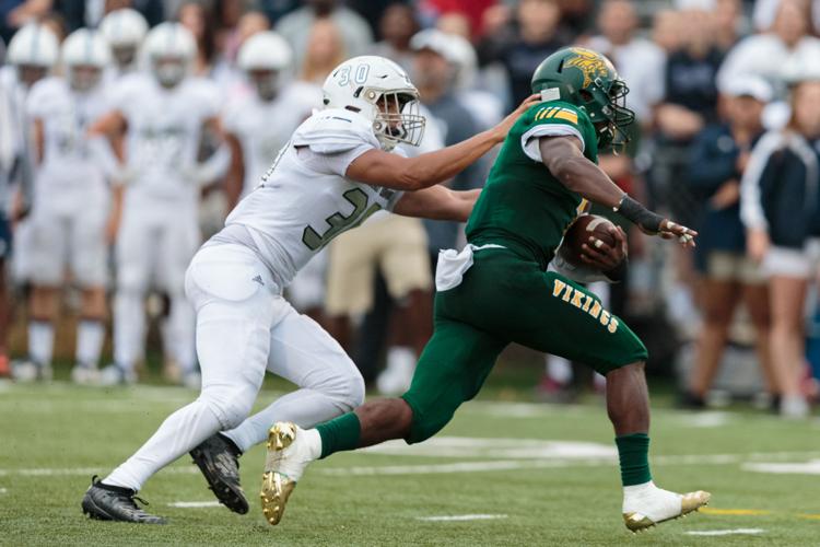 The Ragin' Bulls come from behind in the Battle of the Horns to defeat the Vikings 27-20.