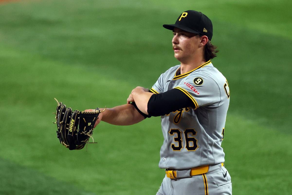 Pittsburgh Pirates pitcher Bubba Chandler walks toward the dugout at the end of the fourth inning against the Texas Rangers at Globe Life Field on Thursday, April 23, 2026, in Arlington, Texas.