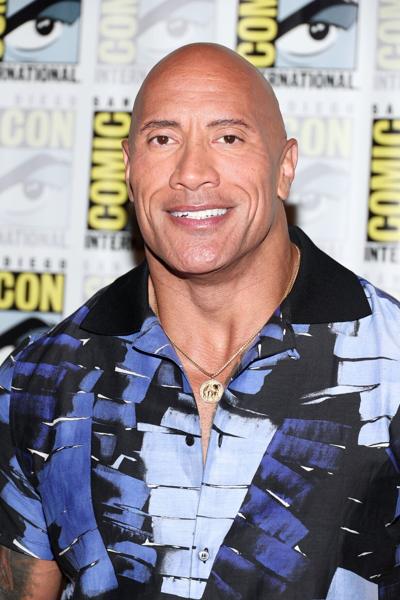 In this photo from July 23, 2022, Dwayne Johnson speaks onstage at the Warner Bros. theatrical session with "Black Adam" and "Shazam: Fury of the Gods" panel during 2022 Comic-Con International: San Diego at San Diego Convention Center in San Diego, Cal...