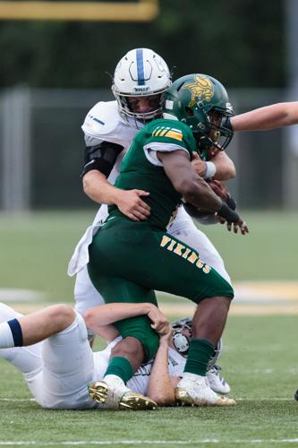 The Ragin' Bulls come from behind in the Battle of the Horns to defeat the Vikings 27-20.