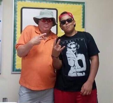 Joe Hudson with one of his middle school students.