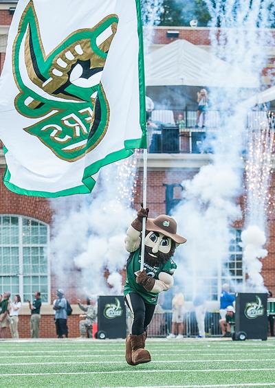 UNCC wins first game