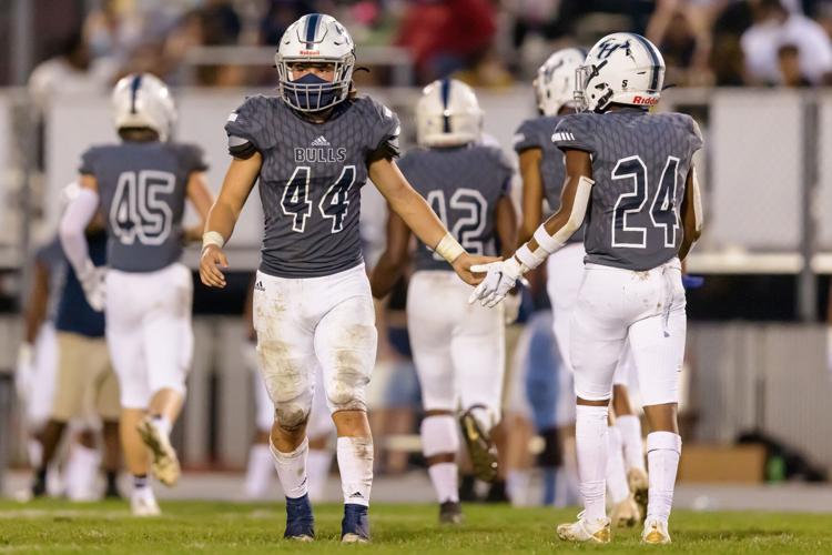 The Hickory Ridge RaginÕ Bulls are defeated by the David W. Butler Bulldogs 52-14 on Friday night at Hickory Ridge High School.