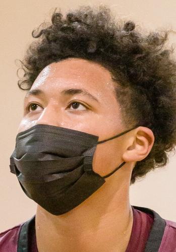 Boys Basketball: The Boys Jay M. Robinson Bulldogs defeated the Hickory Ridge RaginÕ Bulls 72-69 on Thursday night.