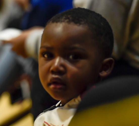 The Trojans defeated the Spiders 51-50 in overtime .