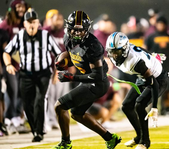 Bulldogs beat the Grizzlies in the third round of the 2025 NCHSAA Football Championship playoff game 41 - 33.