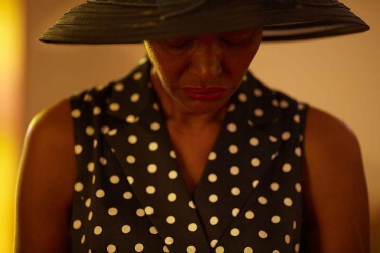 Myra Haynes in prayer at Travis Chapel Methodist Church in Cleveland, Georgia, Oct. 16, 2016. In Chris Aluka Berry's new book, "Affrilachia: Testimonies," this photograph pairs with Kelly Navies’ poem “Testimony."