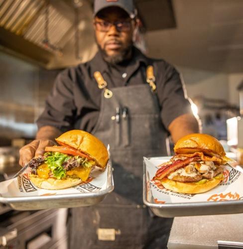 Michael Bowling showcasing some burgers