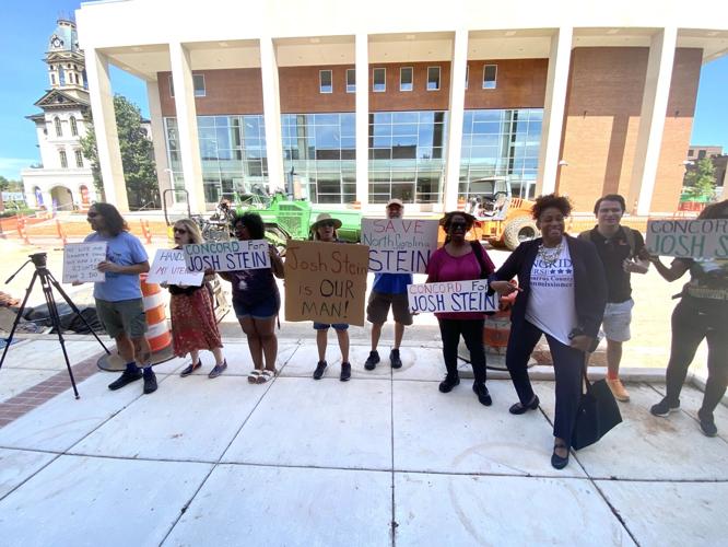 Mark Robinson protests