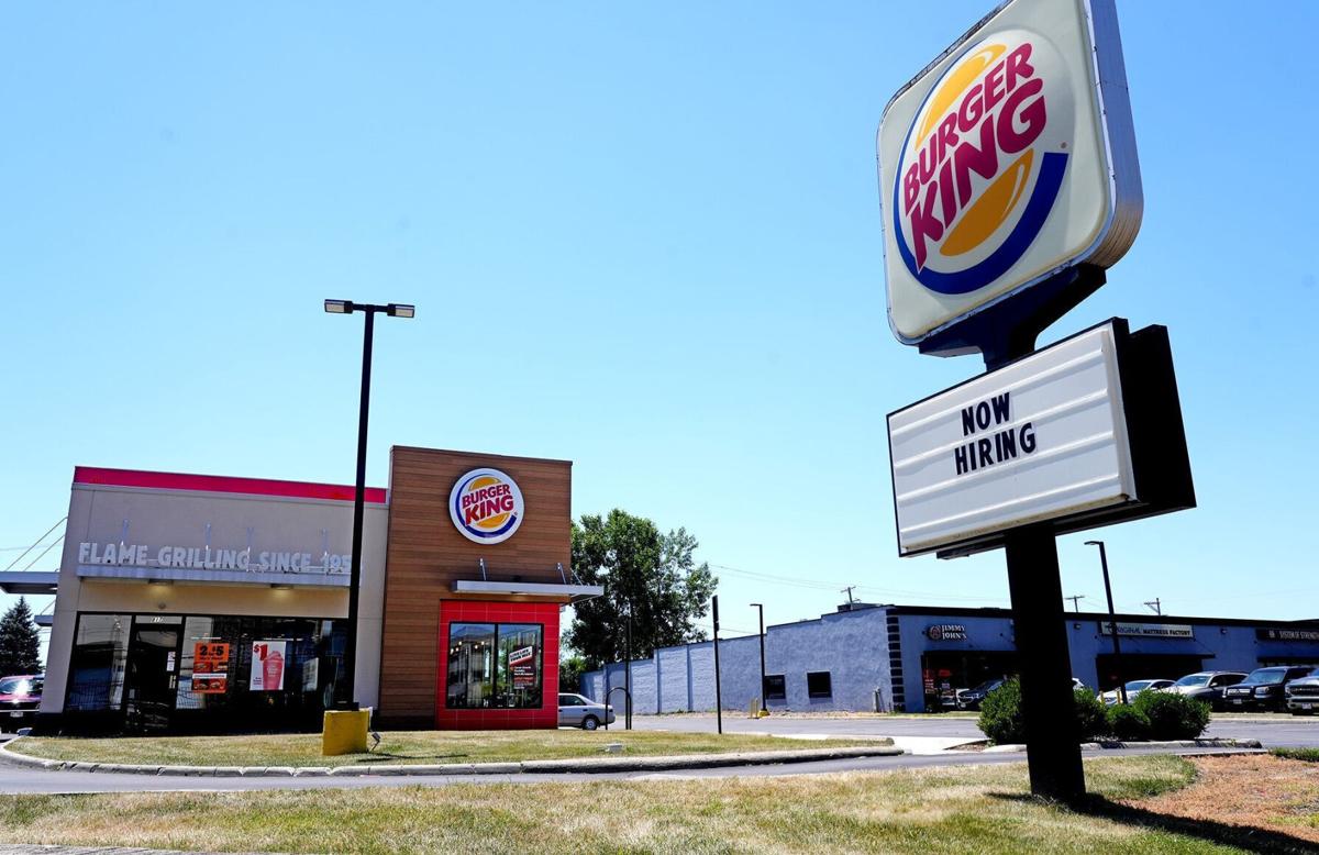 A "now hiring" sign at Burger King, 817 West 5th Ave.