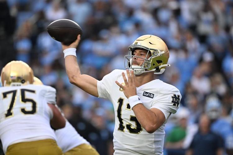 Oct 3, 2026; Chapel Hill, North Carolina, USA; Notre Dame Fighting Irish quarterback CJ Carr (13) passes the ball in the first quaret at Kenan Stadium. Mandatory Credit: Bob Donnan-Imagn Images