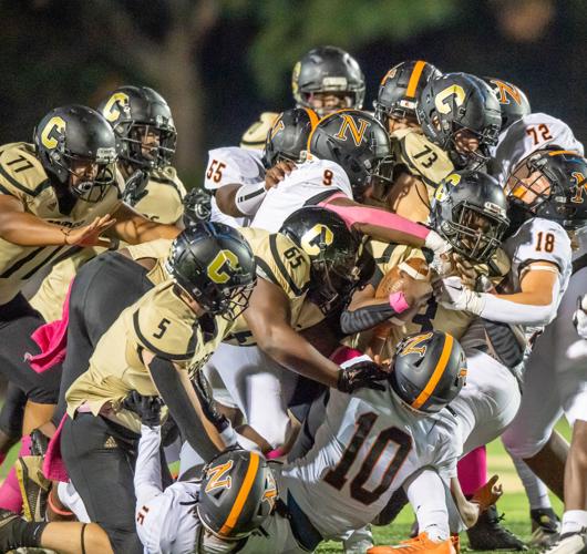 The Spiders suffer a heartbreaking 26-22 loss to the Trojans