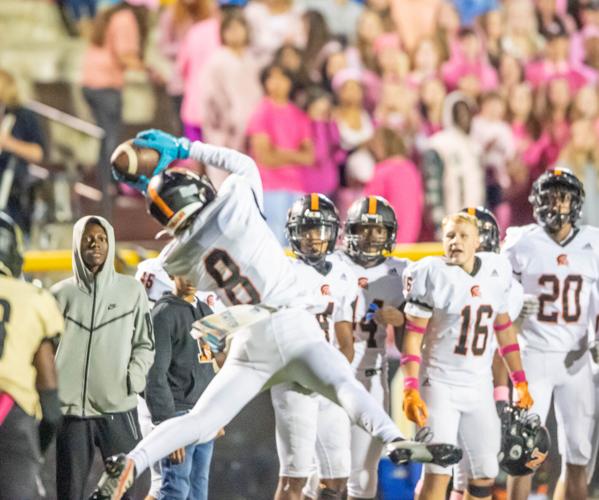 The Spiders suffer a heartbreaking 26-22 loss to the Trojans