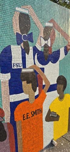 The Wall of Honor on Murchison Road and Langdon Street has been redone in mosaic tile, a joint project of the city of Fayetteville and the Umoja Group. The mural honors Black history and generations of leaders in the area of E.E. Smith High School and F...
