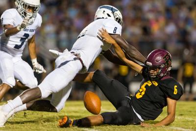 The Ragin' Bulls rebound to defeat the Bulldogs 55-12 at Jay M. Robinson High School