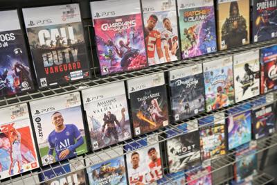 FILE PHOTO: PS5 games by PlayStation are seen for sale at a GameStop in Manhattan, New York