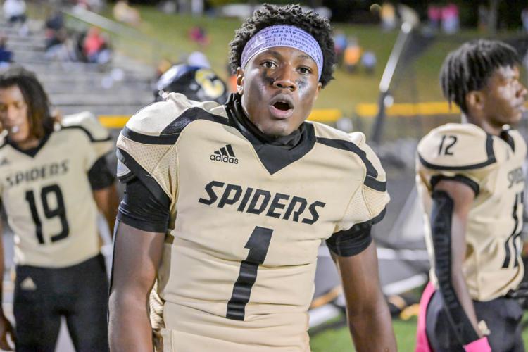 The Spiders suffer a heartbreaking 26-22 loss to the Trojans