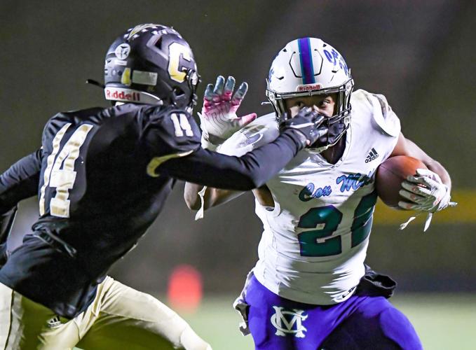 Cox Mill defeated Concord 21-20 on a botched extra point with less than a minute to play.