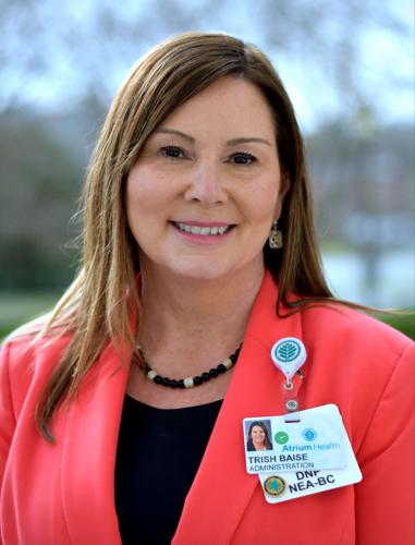 Trish headshot_outside 2.JPG