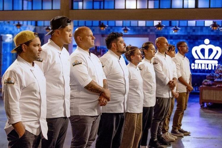 Contestants face the judges on Bravo's "Top Chef," Season 23 filmed in the Carolinas. Pictured: (l-r) Justin Tootla, Laurence Louie, Jonathan Dearden, Oscar Diaz, Jennifer Jackson, Duyen Ha, Brandon Dearden, Sherry Cardoso and Anthony Jones.