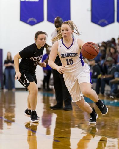 The Cox Mill Chargers host the Jay M. Robinson Bulldogs.