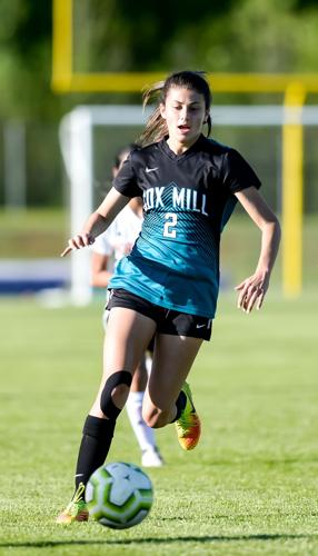 During Tuesday night girls high school soccer action, at Cox Mill field, Concord, North Carolina, Cox Mill Girls handed the Northwest Trojans 7-1 for their first loss of the season. Hannah Dunn (2) goes for the goal.