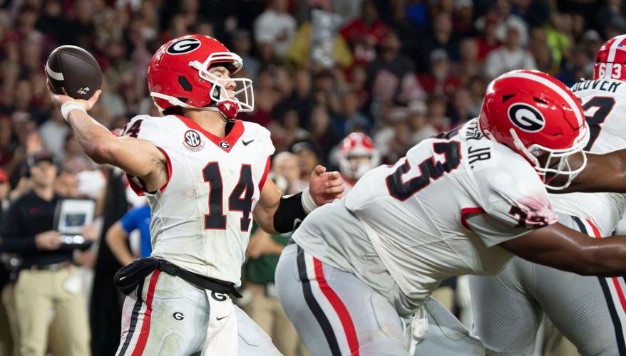 Oct 10, 2026; Tuscaloosa, Alabama, USA;  Georgia quarterback Gunner Stockton (14) throws for a first down late in the fourth